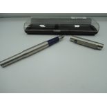 A boxed Parker fountain pen, brushed steel, cartridge, made in the UK