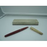 A boxed Parker 61 Heirloom fountain pen, circa 1964, Rage Red with Rainbow cap, fine nib, capillary,