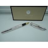 A boxed Veritas silver plated fountain pen, medium nib, cartridge