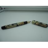 A Palladio fountain pen, Black and White marble, button fill, fair condition