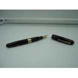A Truepoint Supreme fountain pen, Black glossy, medium nib, button fill, made in the UK