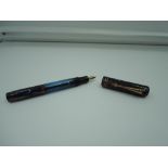 An Ink Vue fountain pen mottled Blue and Gold, medium nib, bulb fill