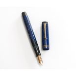 A Parker Fountain pen. A Parker Duofold button fill in Lapis blue with two narrow bands to the