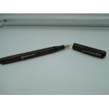 A waterman fountain pen, Hard Rubber medium nib, lever fill, poor condition, made in the UK