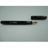 A De La Rue Onoto, The Dainty fountain pen, Black gloss with gold trim, medium nib, lever fill, very