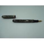 A Boston Moore 92-A fountain pen, circa 1940, silver and green striped, medium nib, lever fill, very