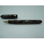 A Conklin Glider fountain pen, circa 1939, brown stripe, medium nib, lever fill, excellent