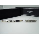 An Ari D Norman boxed Fountain pen with Sterling Silver Overlay (stamped 925), medium nib,