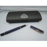 A boxed Parker Rialto fountain pen, 1994, Matte Navy Blue, medium nib, piston fill, made in the UK