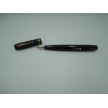 An Empire pen fountain pen, circa 1929, Blue mottled double cap band, medium braod nib, lever