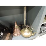 A selection of brass and copper wares including posser head kettle and fire poker