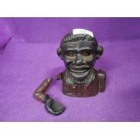 A vintage cast iron money box Little Joe (AF)