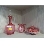 A selection of cranberry glass wares