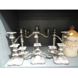 A selection of candle sticks silver plated made in England