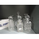 A selection of clear cut glass decanters