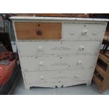 A late Victorian two over three chest, painted and part stripped