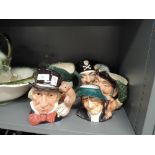 A selection of character jugs including Royal Doulton and similar