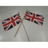 A pair of Union Jack flags on staffs British made