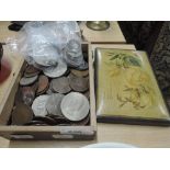 A selection of collectable coins and currency