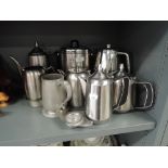 A selection of stainless steel coffee and tea pots