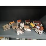 A selection of ceramic miniature houses