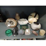 A selection of studio pottery in earthen and stone designs including Ann Nisbet and Malachite