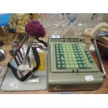 A vintage home rug maker and comptometer