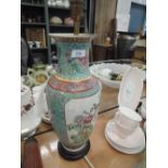 A hand decorated Chinese lamp base