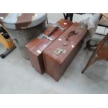 Two vintage leather suitcases