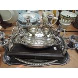 A selection of silver plated items including two butler trays, lidded tureen, pair of three sconce