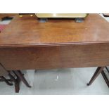 A Victorian mahogany Pembroke style table