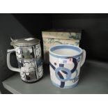 Two Royal Copenhagen peices of decorative collectables, Lidded Tankard 698/3697 and Mug with box