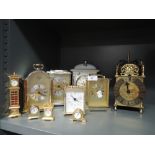 A selection of carriage clocks and similar skeleton clock