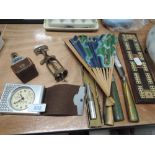 A selection of miscellaneous including treen score board, light meter, travel clock, corkscrew etc