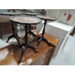 A pair of period style wine tables