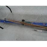 A set of vintage skis and cane poles