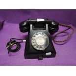 A bakelite bodied telephone