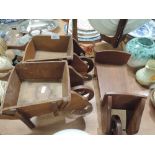 Three wooden decorative wheel barrows ideal for plants