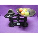 A set of vintage cast kitchen scales