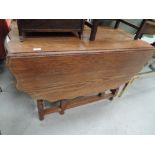 An early to mid 20th Century oak gateleg table