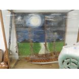 A wooden model Galleon having Nordic flag decoration in traditional stained frame and glazed case
