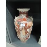 A tall oriental design floor vase