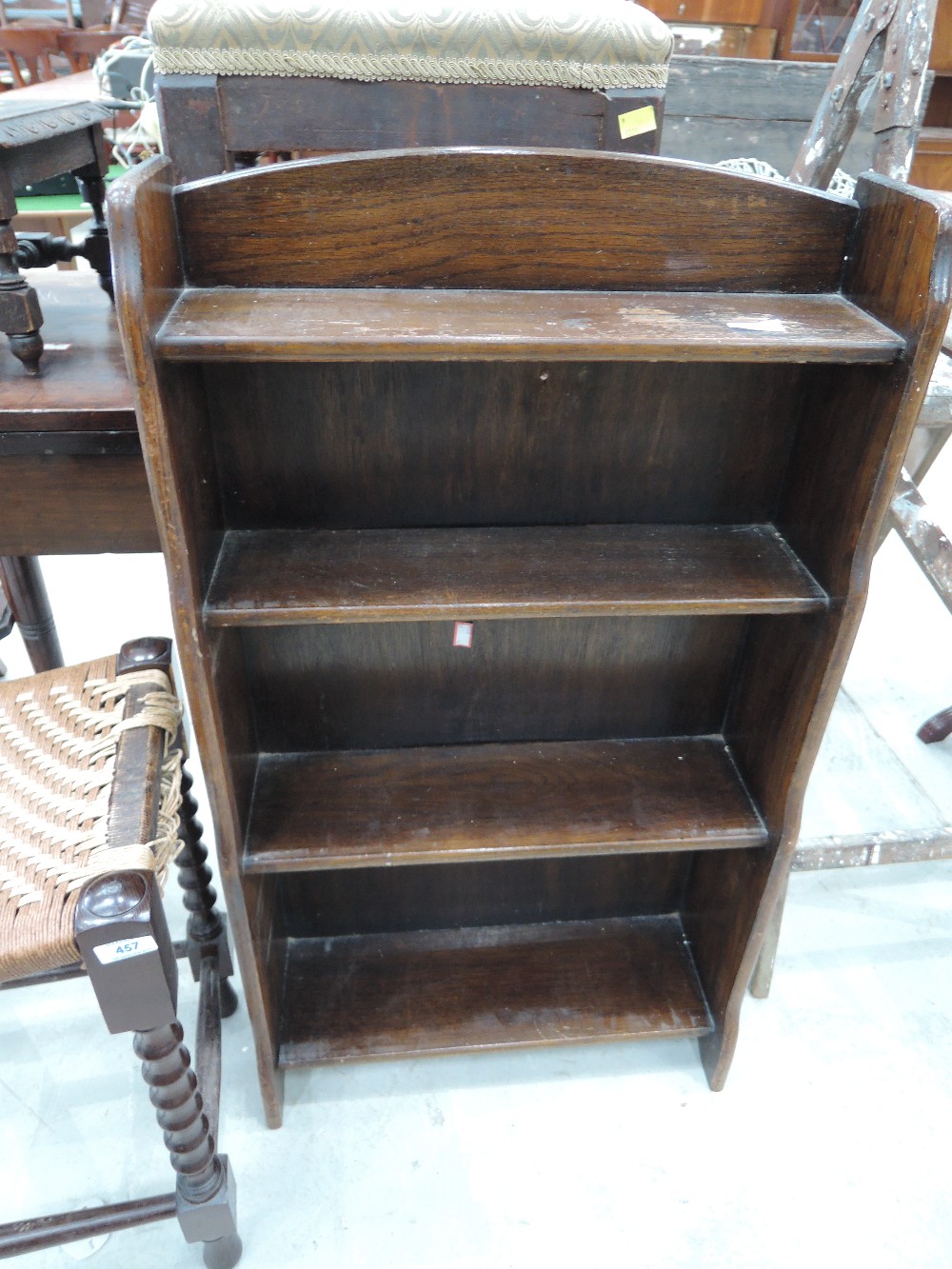 An early to mid 20th Century oak bookshelf, of small proportions