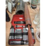 A pair of vintage Zenith 10x50 binoculars, a gents vanity case, a pair of putties, and a cane