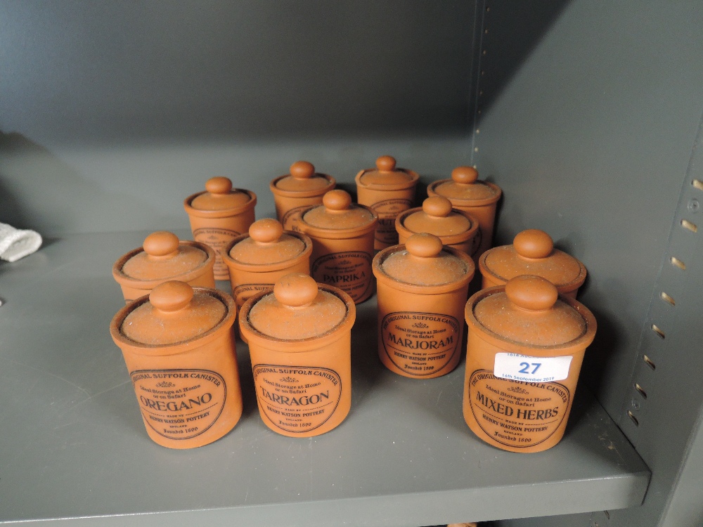 A selection of terracotta kitchen spice jars the Suffolk Cannister