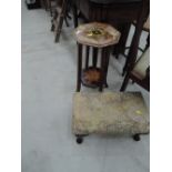 A vintage occasional table and footstool