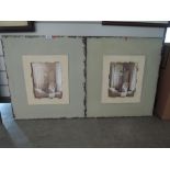 A pair of vintage style prints in distressed wood mounts and frames