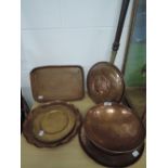 A selection of copper ware including warming pan, arts and crafts style bowl and trays