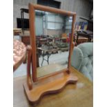 A Victorian bleached mahogany toilet mirror