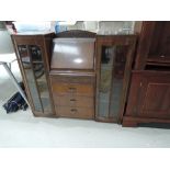 A mid 2th Century oak side by side bureau display